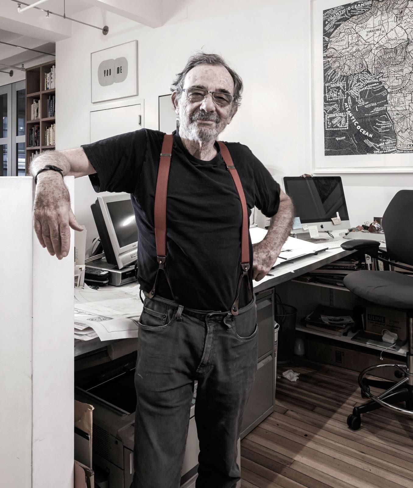 Seymour Chwast in his New York studio, surrounded by illustrations and posters